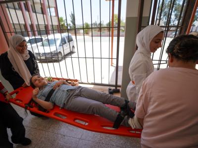 Students in a school of the West Bank are taking part in a safety drill