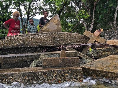 Islanders visit ancestor's graves ruined by rising sea