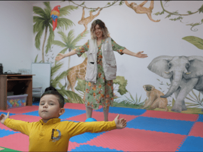 Maher doing the a famous move with his teacher Idil, World Vision Syria Response–  Samer Asaid