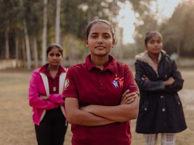 Neha stands proudly with her peers from Rupantaran group. 