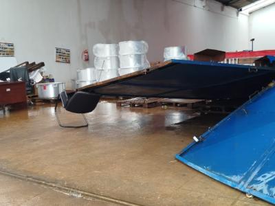 Cyclone Jude hits a warehouse containing food itens to one of the largest school meal programs.