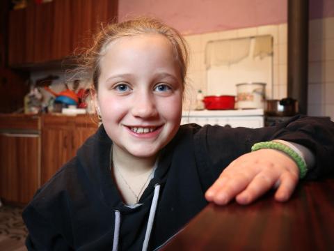 Jelena, 9, inside her home.
