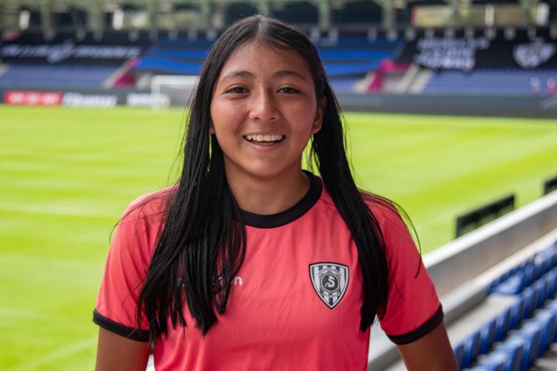 A female soccer player who shines with her own light