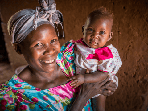 Mother holding child