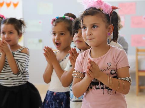 Amina participating in her class