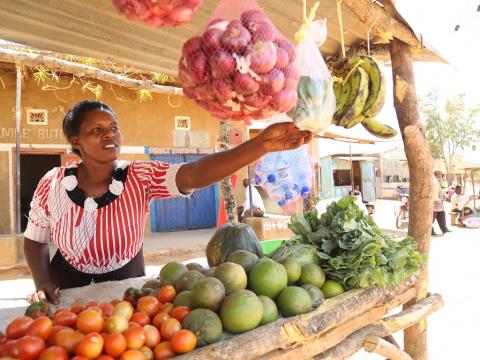 Janeffar used money received from cash transfers to grow her vegetable business at Kalawa in Kenya's Machakos County. @World Vision Photo/Hellen Owuor