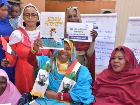 Never ever give up is the sign Niemat hangs up at the front door of her office to remind her daily 