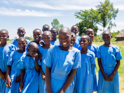 Girls in blue school uniforms in Uganda