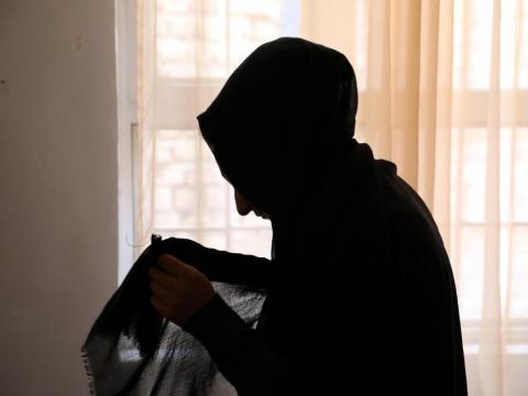 Woman in shadow in Afghanistan