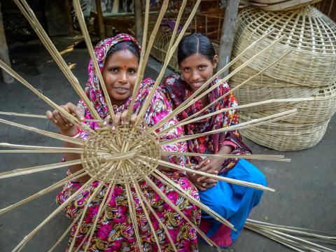 Shabitri and her daughter Ratna at Shabitri's small business