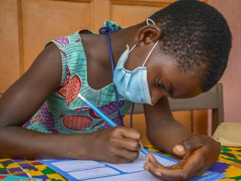 Child writes a letter to her sponsor