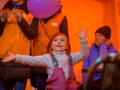 Ukrainian 4-year-old playing with a balloon