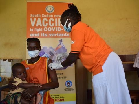 Breastfeeding mother has her COVID vaccination in South Sudan.