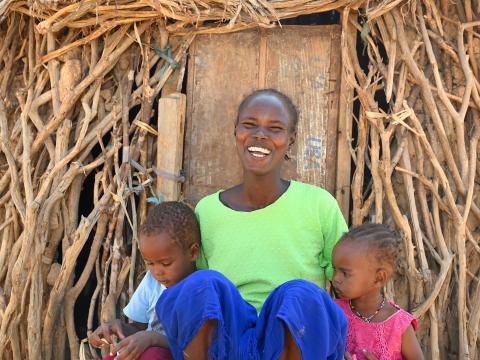 Aruo is happy that her two children are now enjoying good health, thanks to knowldge she obtained on the significance of embracing good hygiene and proper sanitation. ©World Vision Photo/Sarah Ooko.