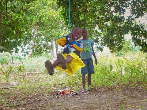 Mary enjoys swinging on a tree