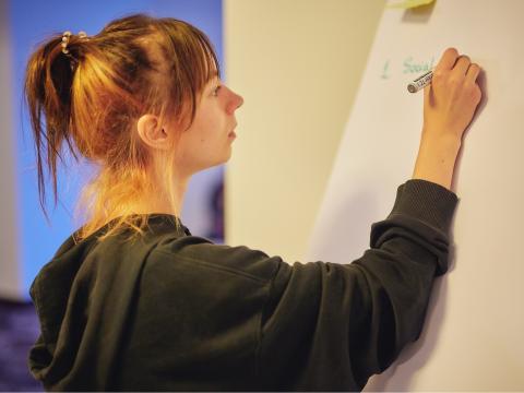 Georgiana Writing on board