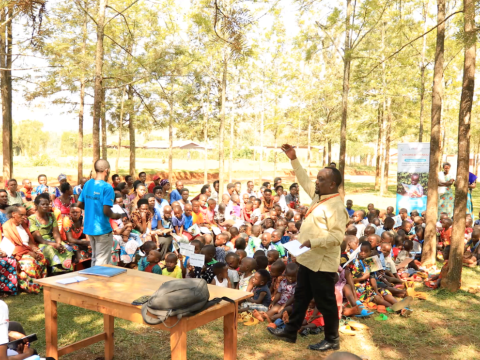 Parents and children gathered during a community engagement session