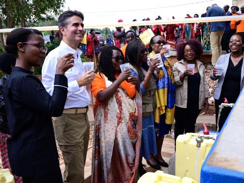 A photo of World Vision USA President, WV East Africa Regional Leader, WV Rwanda, Rwanda Government officials and partners celebrating reaching 1 million people with access to clean water in Rwanda.