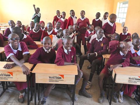 World Vision donated desks to Chepseon Primary School in Salgaa, Nakuru County, aimed at improving the learning conditions in the school. ©World Vision Photo/Sarah Ooko.