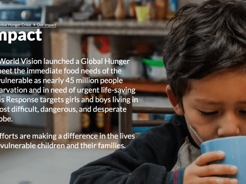 Little boy drinking out of blue cup