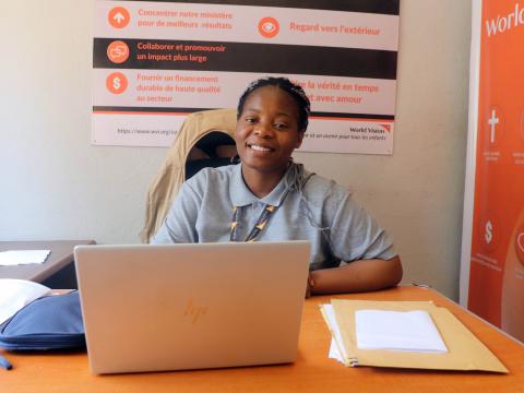 Manuela, a World Vision staff in her office