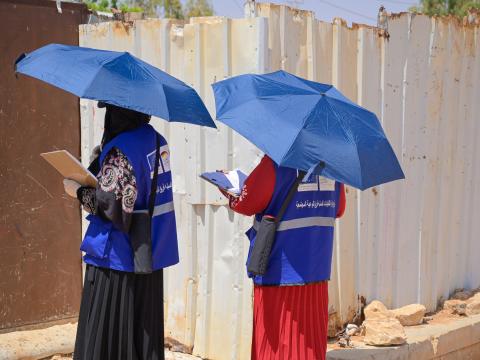 Aya and Sarah conducting door to door awareness sessions in Azraq Camp for the Solid Waste Management Programme.