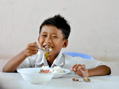 A child having a meal at school