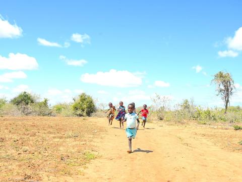 Eight-year-old Nadzuwa, playing with her siblings and friends.