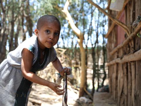 A girl washing her hands