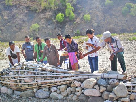 Madalena and the team are observing traditional gabion built by community