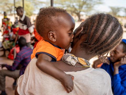 Baby Daniel kisses his mother, Margaret.