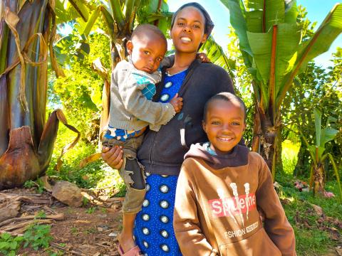 Tadelech with her family at her backyard