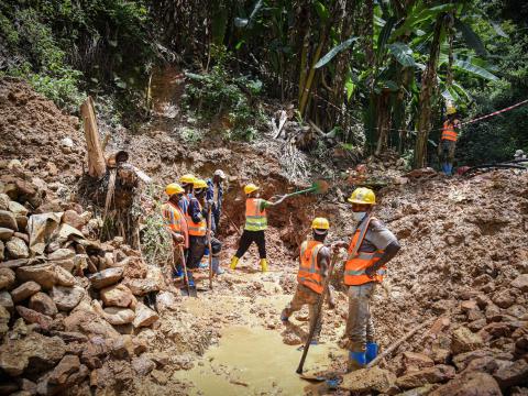 Workers digging to get Water