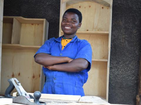 Yvonne is an 18-year-old girl who lives in Huye District. She is the first born in a family of four girls. 