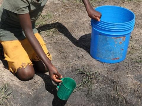 Lizete is a 12 years olds and walks almost 1km from their home to a lowland area to dig holes and scoop water.