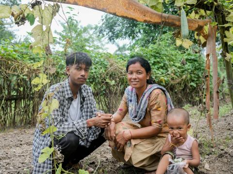 (from left) Roshan, Sundari and Dharmesh in their farm in Kailali