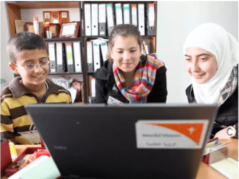 3 Children in front of computer