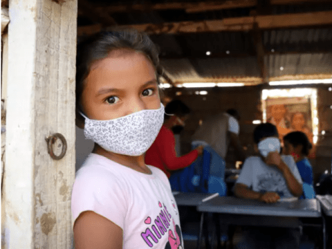 Girl in PPE mask