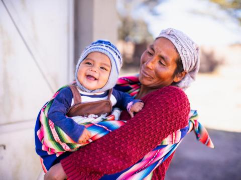 A Bolivian mother holding her toddler