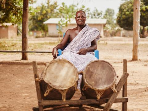 A man wearing traditional Ghanian textile