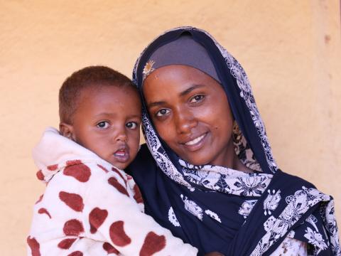 Asante and her son Walid smiling