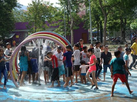 A group of children play in a water park at a World Vision’s Peace club gathering in Honduras