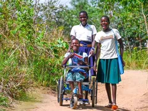 Melisa center with her friends Joy(R) and Patricia (behind her) returning from school.