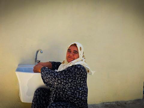 Saad utilizes specially designed sanitary facilities to accommodate her needs. Mohamd Ahmed Ali © World Vision Iraq 2024.