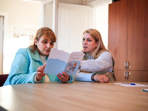 Elena from World Vision Georgia introducing health services to Nino from Samtskhe-Javakheti 