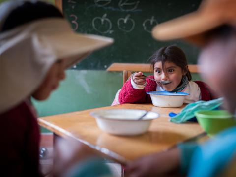 Children in LACR enjoy a school meal