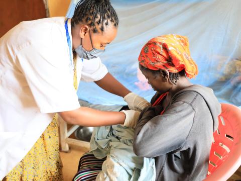 A child getting checked at healthcare 