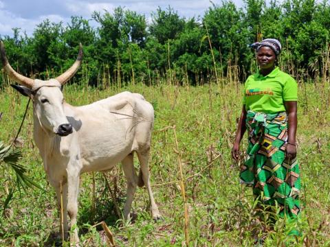 Germaine shows us the beef she bought with credit from the AVEC group.