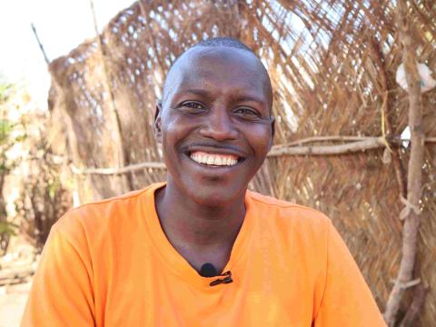 Refugee volunteer teacher