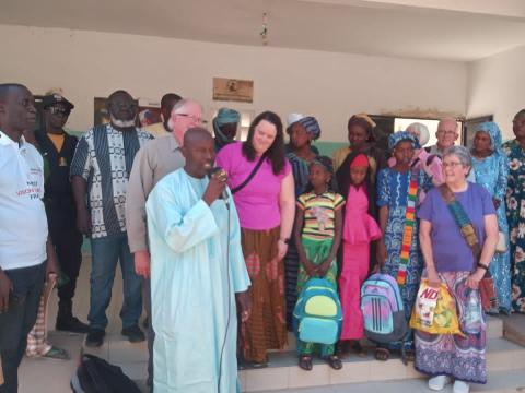 The US sponsors and their goddaughters happy to meet.